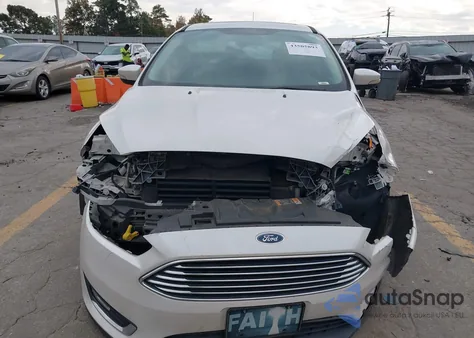 2016 Ford Focus Titanium z USA, uszkodzony, nr VIN 1FADP3N26GL222971